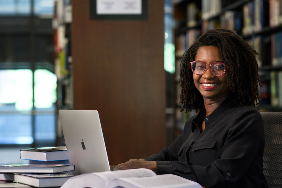 A faculty in front of a computer