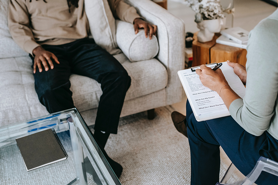 Person sitting on couch