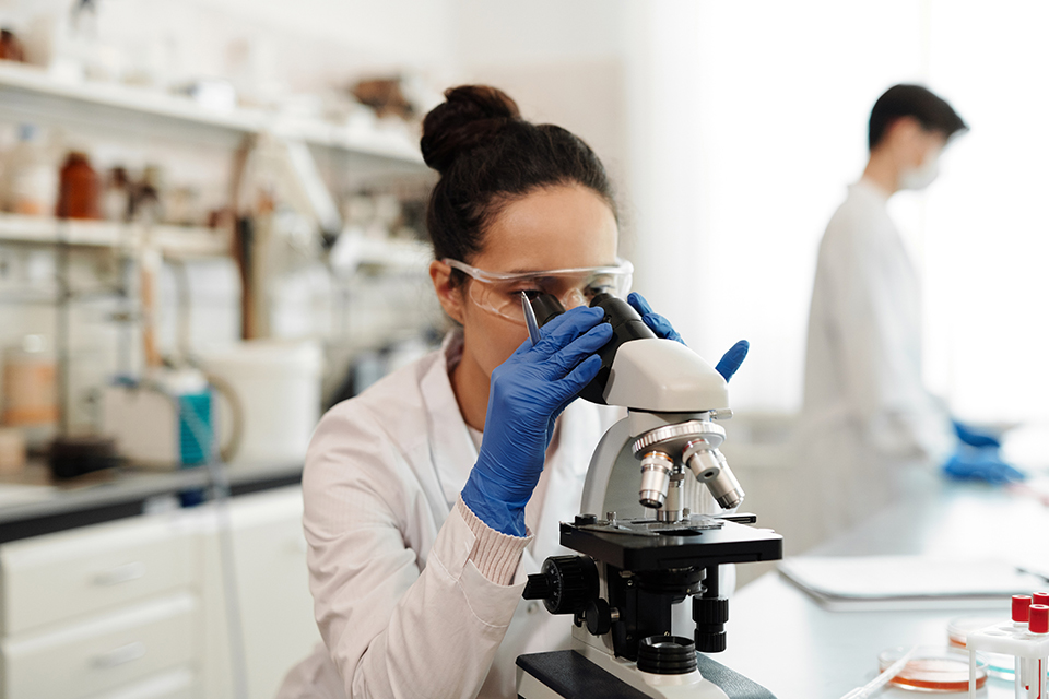 Student with microscope