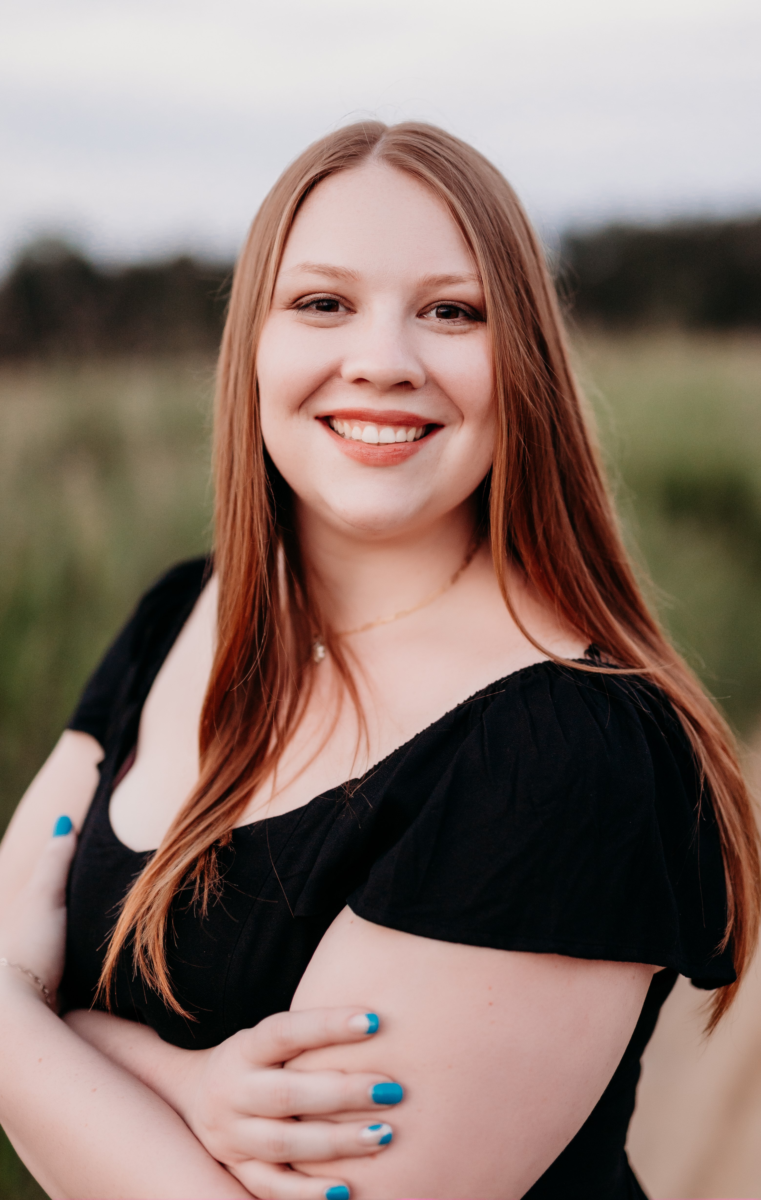 Taylor May headshot photo