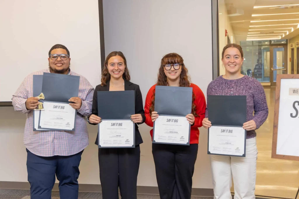 Say It BIG 2025 winners holding certificates at the Human Development and Family Science experiential learning competition